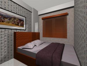 Desain kamar tidur utama apartemen Green Bay Pluit